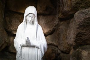 statue of Blessed Mary with hands in prayer helps us pray for adoption