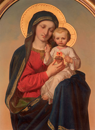 Saint Theresa comforting baby in prayer