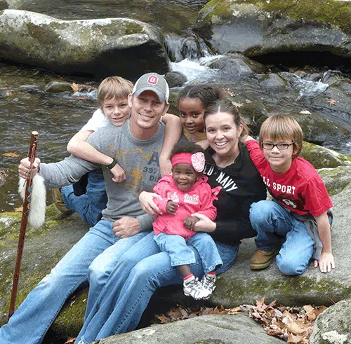happy adoptive family built through research on open adoption