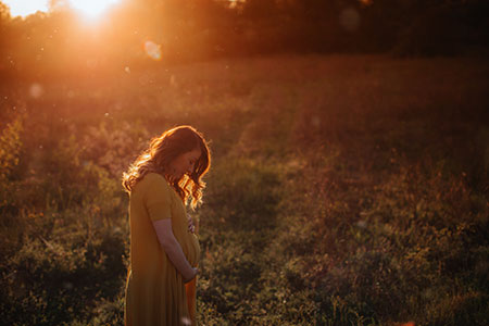 a pregnant woman in prayer